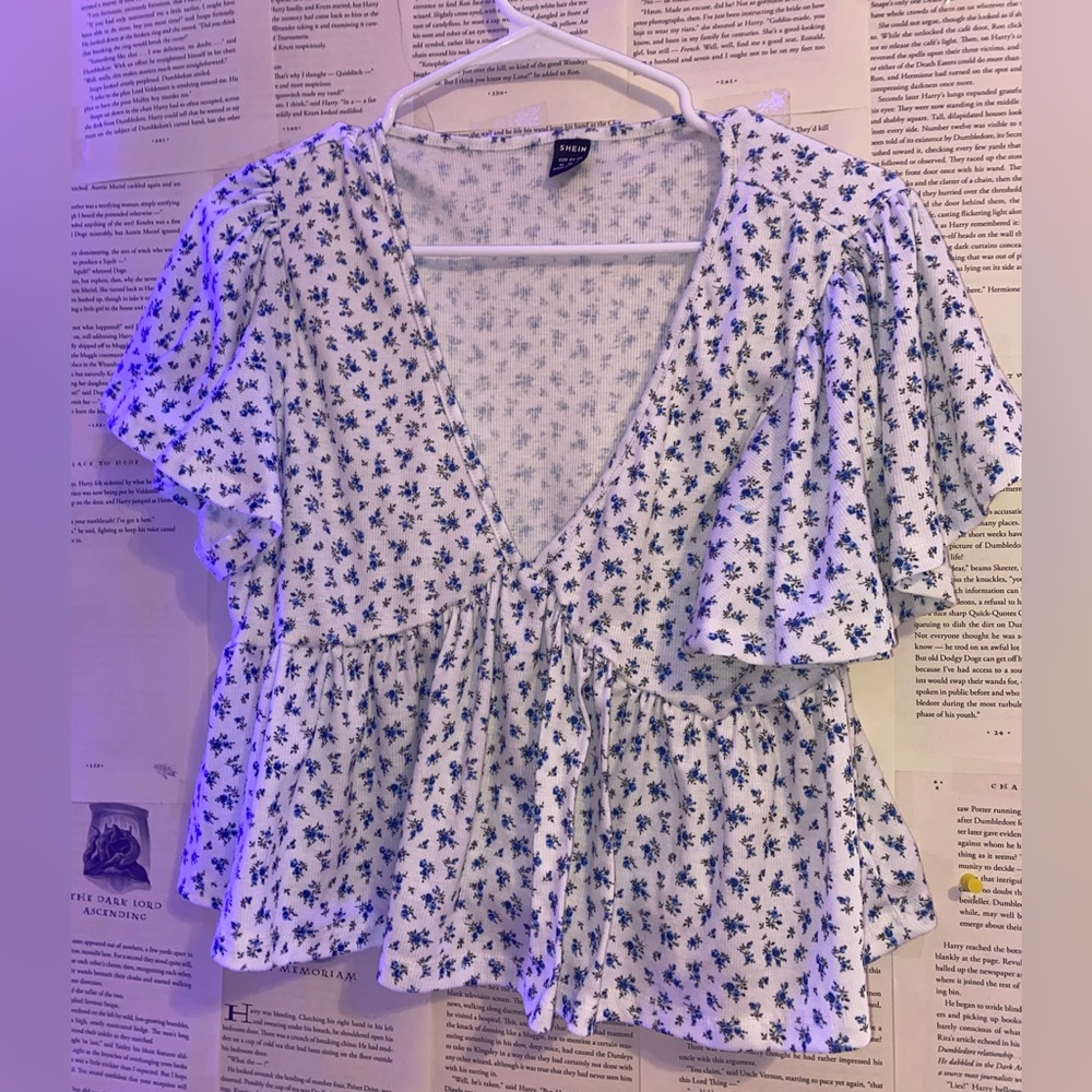 White blouse with blue flowers